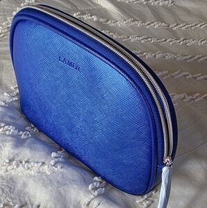 La Mer Blue Cosmetic Bag with Structured Design